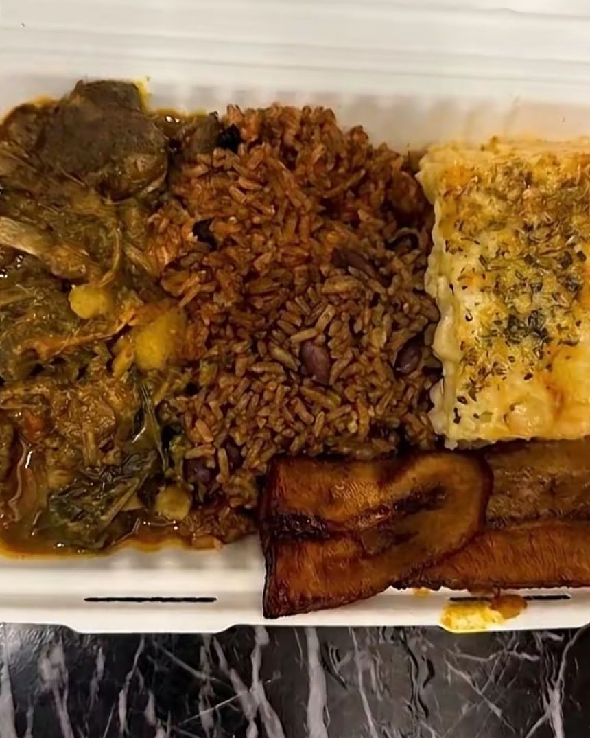 Curry goat with rice and peas, mac and cheese and plantain